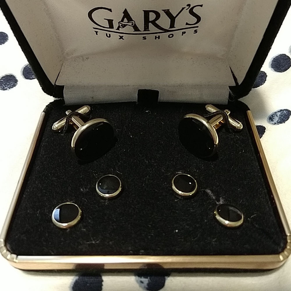 Black and gold cufflinks and studs
